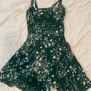 The reformation green and white floral mini dress. Size 4